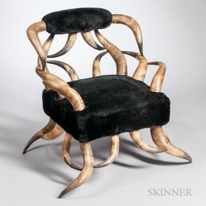 Black-upholstered Steer Horn Armchair