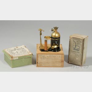 Three Aspirators and a Respirator in Original Boxes