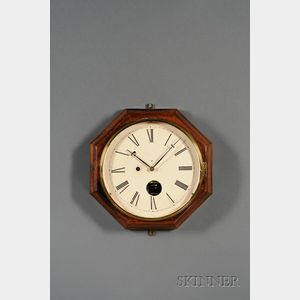 Rosewood Octagonal Wall Clock by The Marine Clock Manufacturing Company