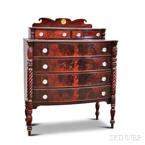 Classical Carved Mahogany and Mahogany Veneer Bow-front Chest of Drawers