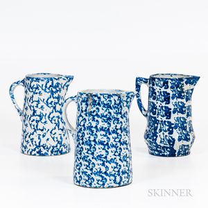 Three Blue Sponge-glazed Stoneware Jugs