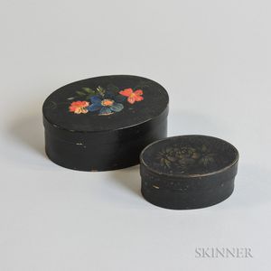 Two Small Black-painted Finger-lapped Pantry Boxes