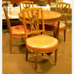 Set of Four Provincial Louis XVI Style Salmon-colored Leather Upholstered Carved Walnut Chairs and Circular Tab...