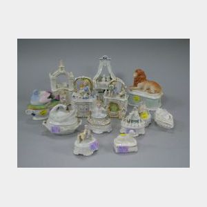 Thirteen Porcelain Figural Trinket Boxes.
