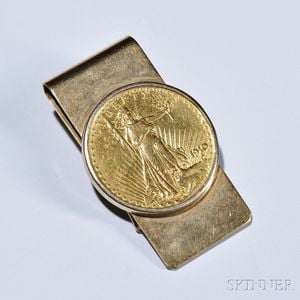 Gold Coin-mounted Money Clip, Tiffany & Co., set with a Saint-Gaudens $20.00 gold coin, 14kt gold mount, 36.9 dwt, signed.