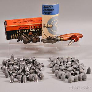 Group of .58 Caliber Bullets and a Bullet Mold