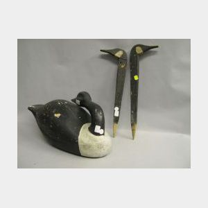 Carved and Painted Wooden Preening Canada Goose Decoy and Two Stick Decoys.