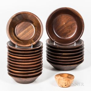 Twenty Turned Walnut Bowls and a Spalted Maple Candleholder. 
