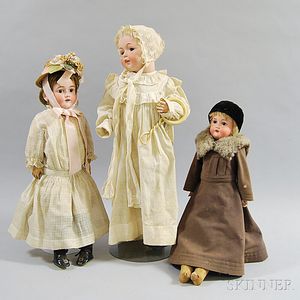Three Bisque Head Dolls