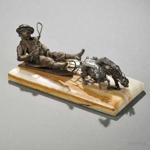 Bronze and Spelter Model of a Boy on a Sled