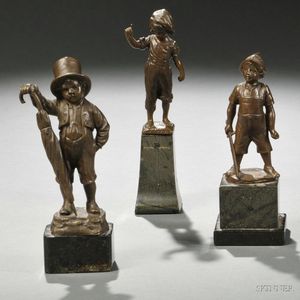 Three Small Bronze Figures of Boys