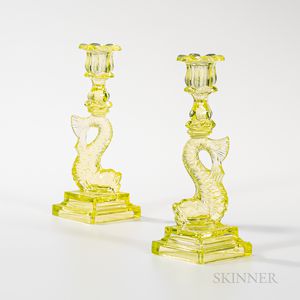 Pair of Vaseline Glass Blown Molded Dolphin Candlesticks