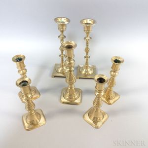 Three Pairs of Brass Candlesticks and a Single Candlestick