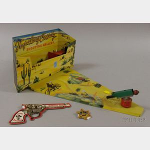 Hopalong Cassidy Chromolithographed Tin Wind-up Shooting Gallery, a Posts Raisin Bran Tin Star, and a Hopalong...