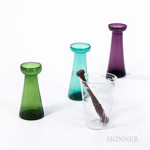 Three Colored Glass Hyacinth Vases, a Glass Beaker, and a Wooden Pestle