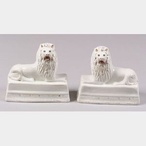 Pair of Staffordshire-type Earthenware Recumbent Lion Figures