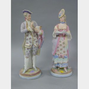 Bisque Figural Gentleman and Lady.