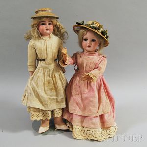 Two German Bisque Head Girl Dolls