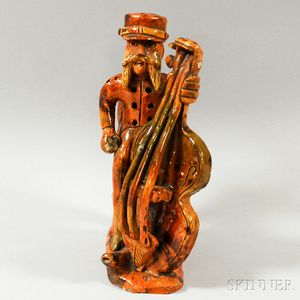 Redware Pottery Figure of a Bearded Man Playing Cello