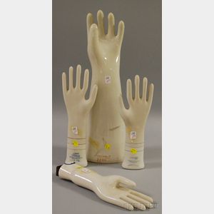 Large Porcelain Lineman's Glove Form and Three Porcelain Lady's Glove Forms