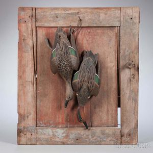 Two Carved and Painted Hanging Teal Figures