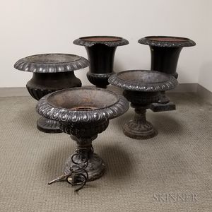 Five Black-painted Cast Iron Garden Urns
