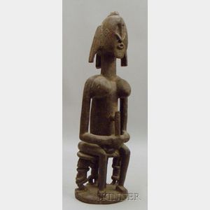 African Carved Seated Fertility Figure