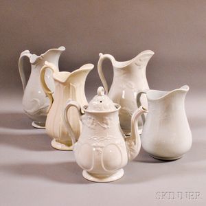 Four Ironstone Pitchers and a Coffeepot