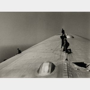 Alfred Eisenstaedt (American, 1898-1995) Repairing the Hull of the Graf Zeppelin During the Flight over the Atlantic