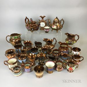 Thirty Copper Lustre Ceramic Vessels. 
