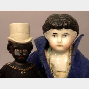 Two Small China and Bisque Shoulder Head Dolls