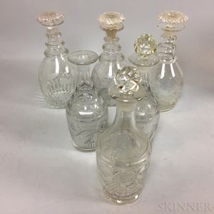 Six Cut and Blown Colorless Glass Decanters