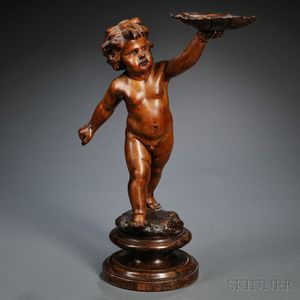 Carved Fruitwood Figure of a Putto