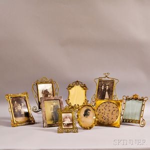 One Sterling and Eight Brass Picture Frames. 