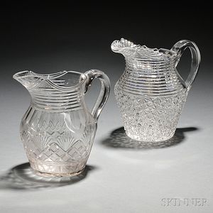 Two Colorless Cut Glass Pitchers
