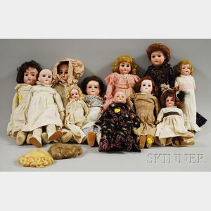 Eleven Small German Bisque Head Dolls