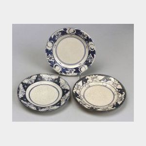 Three Dedham Pottery Saucers