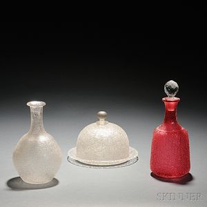 Three Overshot Glass Objects