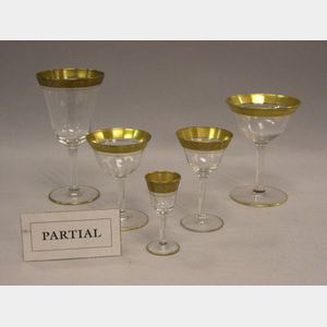 Fifty-eight Pieces of Gilt Colorless Glass Stemware.