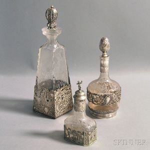 Three Silver-mounted and Etched Glass Colognes