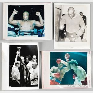 Four Press Photographs of Heavyweight Champion Boxer George Foreman.