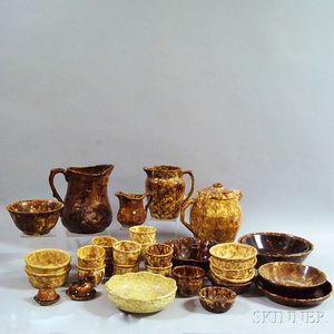 Thirty-one Pieces of Rockingham-glazed Pottery