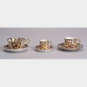 Group of Assorted Royal Crown Derby Bone China Cups and Saucers
