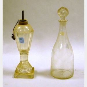 Colorless Glass Whale Oil Lamp and a Colorless Blown Glass Decanter.