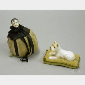 Two Art Deco Porcelain and Cloth Figural Pincushions