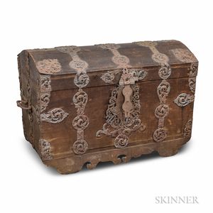 Large Carved Wood and Iron Trunk on Wheels