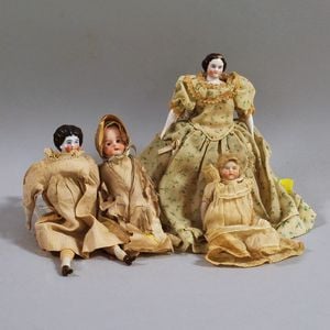 Four Small Antique Dolls