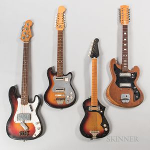 Electric Bass Guitar and Three Electric Guitars