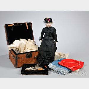 Bisque Head Swivel Neck Lady Doll with Trunk, Clothing, and a Tea Set