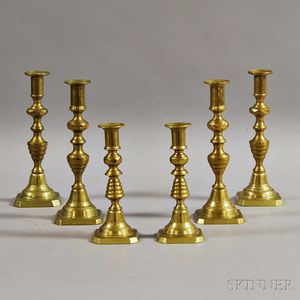 Three Pairs of Continental Brass Candlesticks